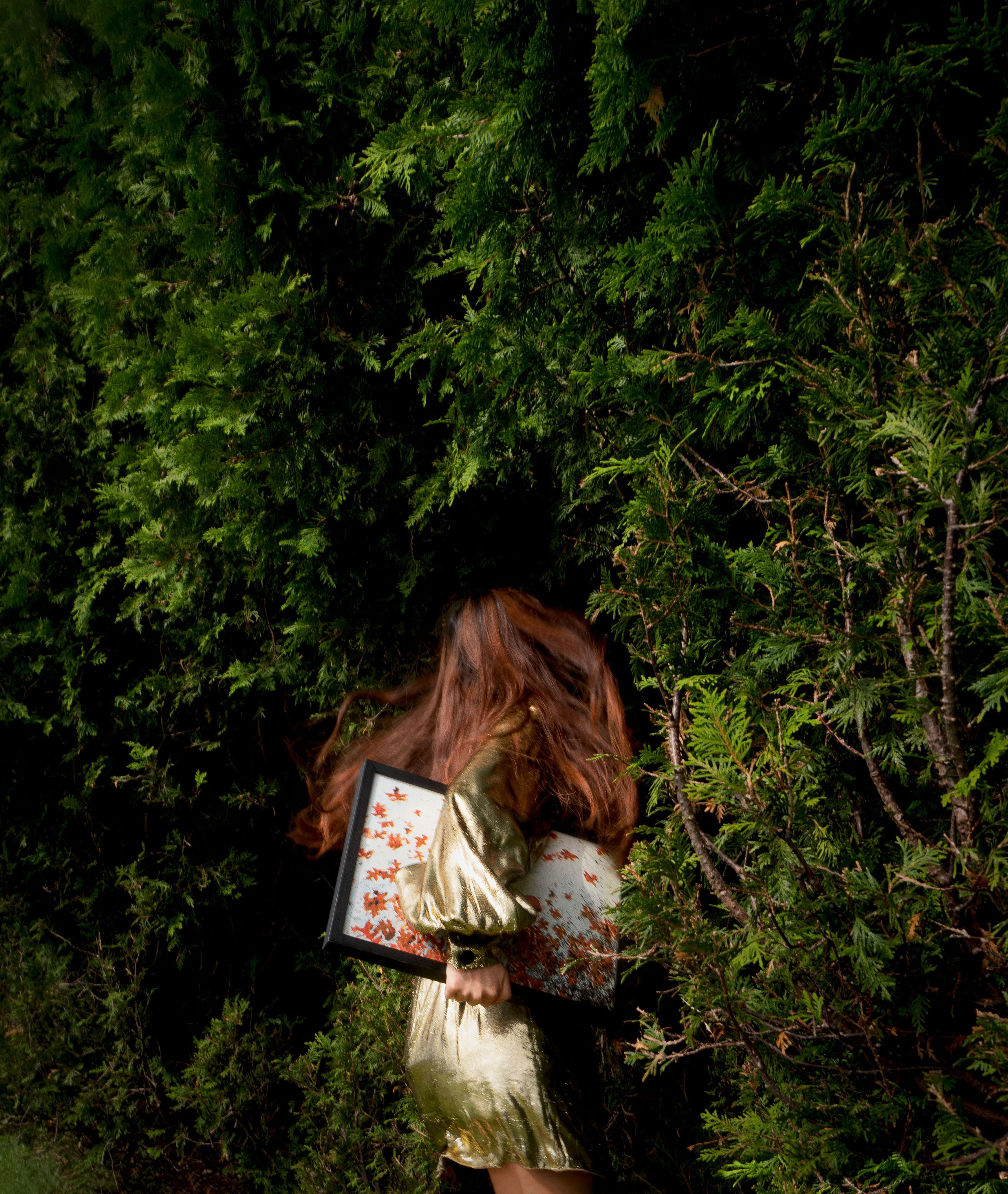 woman in bushes